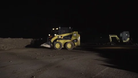 Skid-steer loader spinning Stock Footage 91496585