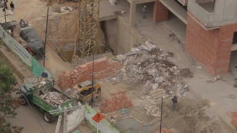 Skid-steer loader working on construction site in Cali, Colombia Stock Footage 88389612