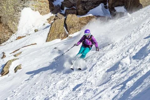 Skier on a background of rocks Foto stock