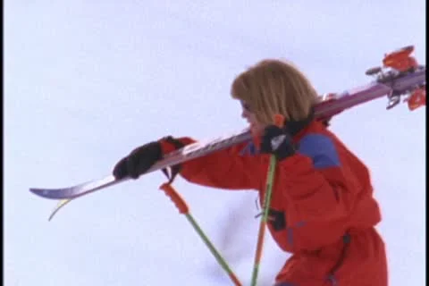 A skier climbs up a slope. Stockbeeldmateriaal 10578304