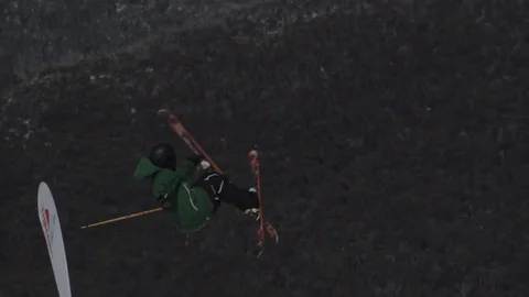 Skier in dark green jacket performs again. Stock Footage 81882408