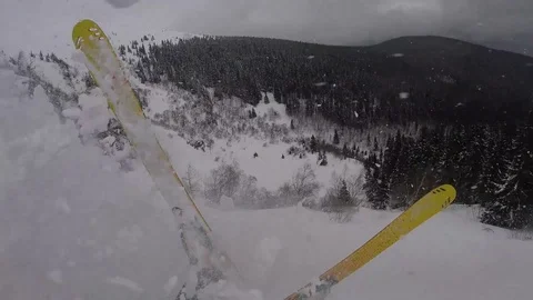 Skier deploys airbag to save himself from avalanche Stock Footage 88206494