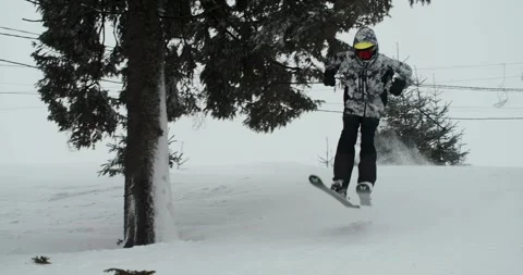 A skier drives up to the tramway Stock Footage 264985824