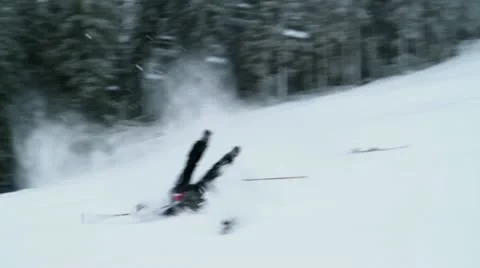 Skier fall down the slope Stock Footage 27879005