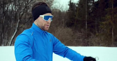 A skier in the forest. A man is doing cross-country skiing. Stock Footage 294681106