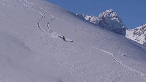 Skier free ride in mountain Stock Footage