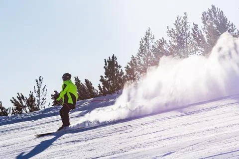 Skier going down the mountain Stock Photos