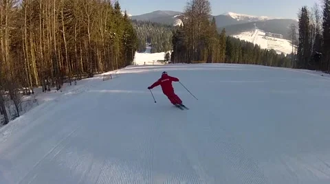 Skier going down the ski run in Bukovel, Ukraine Stock Footage 48597024