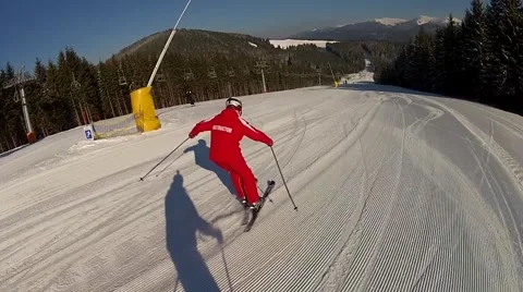 Skier going down the ski run in Bukovel, Ukraine Stock Footage 48597037