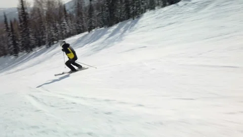 Skier going down the slope Stock Footage 117995208