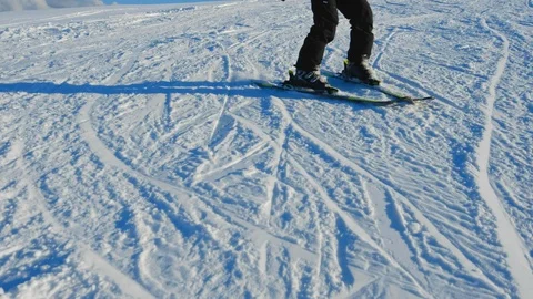Skier having fun on snow mountain. Legs view of young man on ski slope. Stock Footage 112684066