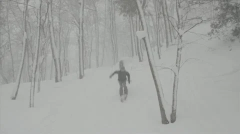 Skier Jumps Downhill Stock Footage 22419821