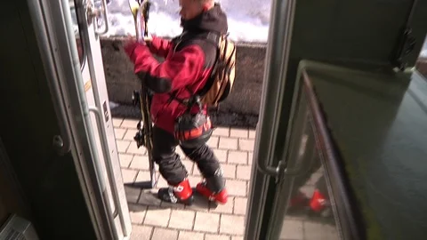 SKIER JUMPS OFF THE SNOW TRAIN Stock Footage 121858628