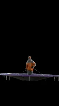 Skier Jumps on Trampoline Stock Footage 79570