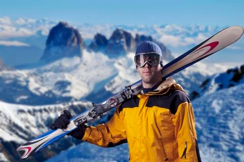 Skier looking at the mountains Stock Photos