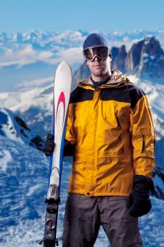 Skier looking at the mountains Stock Photos
