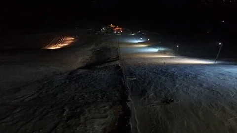 Skier making tricks on the night slope. Stock Footage 69941364
