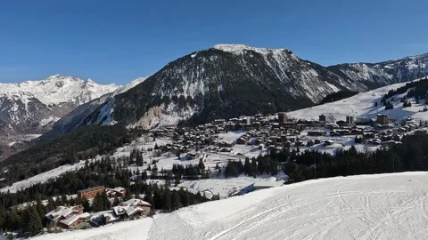 Skier recording while skiing in Courchevel ski resort slopes Stock Footage 336972168