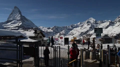 Skier running to catch the train to the top of ski resort and missing it. Stock Footage 334122511