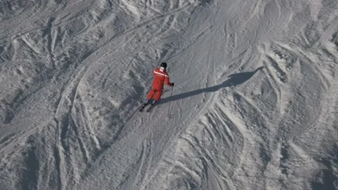 Skier skiing down slope at high speed Stock Footage 183362043