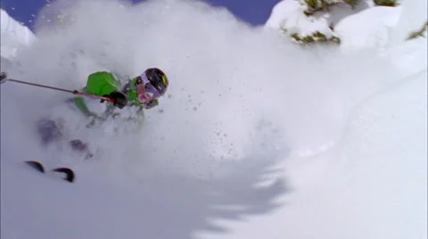 Skier skiing on mountain slope Stock Footage
