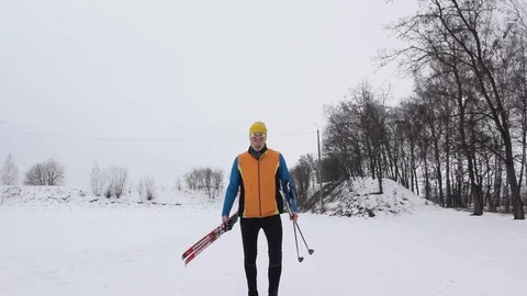 Skier in the snow-covered forest Stock Footage 86329613