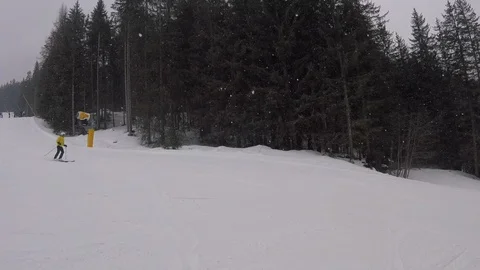 Skier in a snowfall Stock Footage 125568380