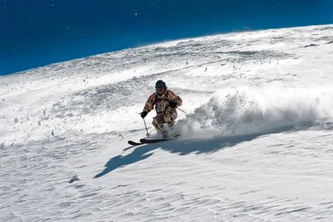 .skier in soft snow Stock Photos