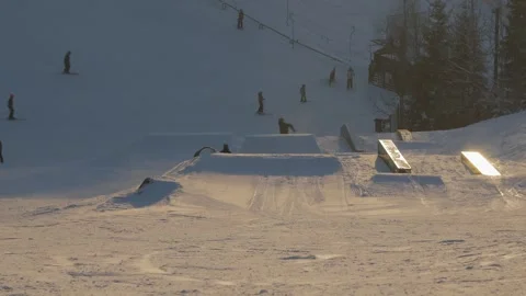 Skier Spins Once After Jumping Trampoline Performs Rodeo Bio-Flip Trick Stock Footage 291323768