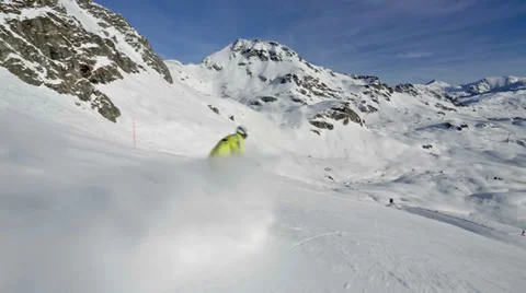 Skier splashing snow on camera Stock Footage 33216543