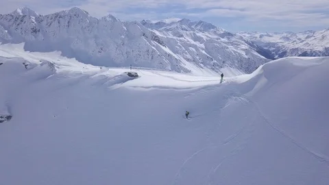 A skier start a freeride down from, La Rosiere, Espace San Bernardo, France Stock Footage 116160842