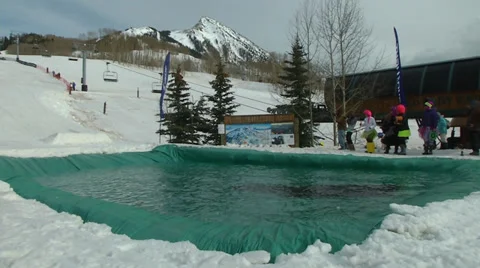 Skier Supermans into pond Video stock 38607296