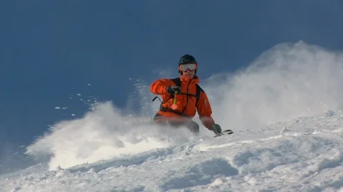 Skier on winter powder slope, Alta, Utah in Little Cottonwood Canyon. Stock Footage