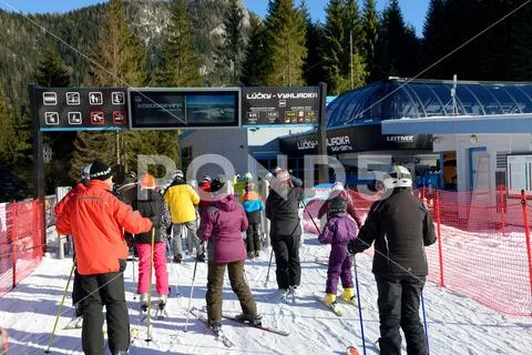 The skiers and Lucky-Vyhliadka cableway station in Jasna Low Tatras Stock Photos