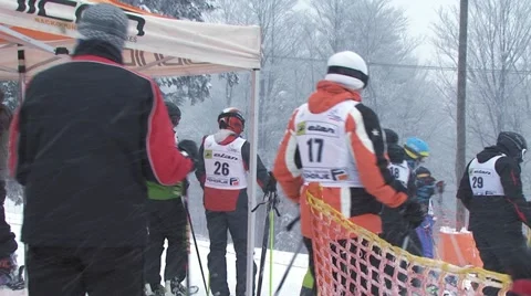 Skiers are preparing for downhill Video stock 12757578