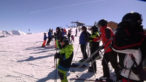 SKIERS GET READY TO SKI Stock Footage 121444618