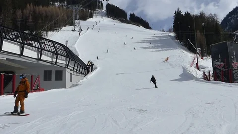 SKIERS HIT THE SLOPES Stock Footage 121859247