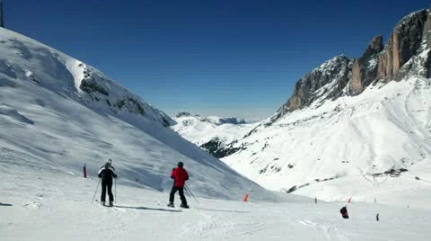 Skiers on a piste Stock Footage 10830834