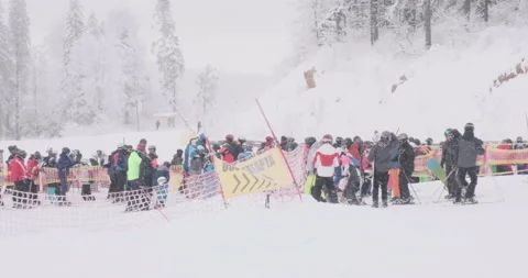 Skiers queue as ski resorts remain open in Romania during Covid-19 (Coronavirus) Stock Footage 146860430
