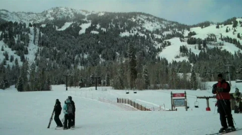 Skiers at a resort base Stock Footage 635981