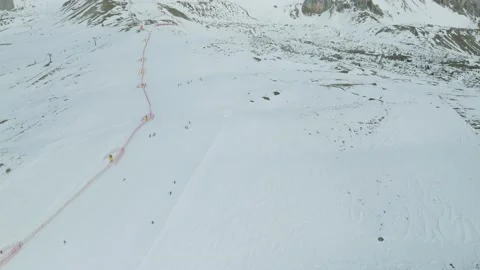 Skiers on a ski slope Stock Footage 233934823