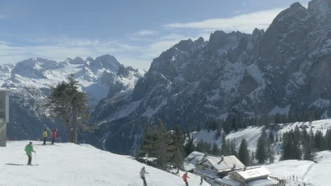 Skiers Skiing Down The Ski Slopes Sunny Mountain Ski Resort Austria Europe Stock Footage 104114699