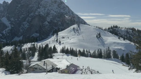 Skiers Skiing Down The Ski Slopes Sunny Mountain Ski Resort Austria Europe Stock Footage 104114752