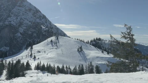 Skiers Skiing Down The Ski Slopes Sunny Mountain Ski Resort Austria Europe Stock Footage 104114764