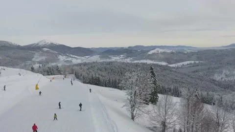 Skiers skiing on mountain Stock Footage 150353855