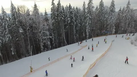 Skiers skiing on mountain Stock Footage 150353939