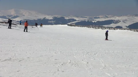 Skiers slide down, slope, mountain resort, winter sport Stock Footage 37183977