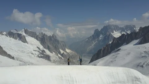 Skiers on snowy mountains Stock Footage 124836923