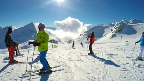 Skiers on the top of the mountain. Stock-Footage 73871823