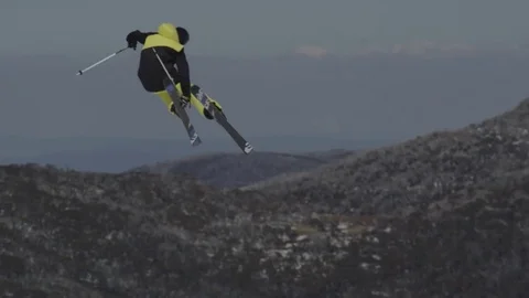 Skiier performing large jump. Stock Footage 81882373